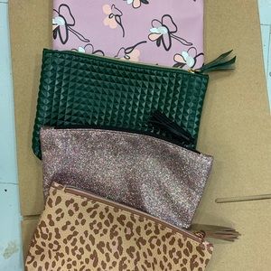 Set of 4 Ipsy makeup bags. 7” wide. 5” tall.